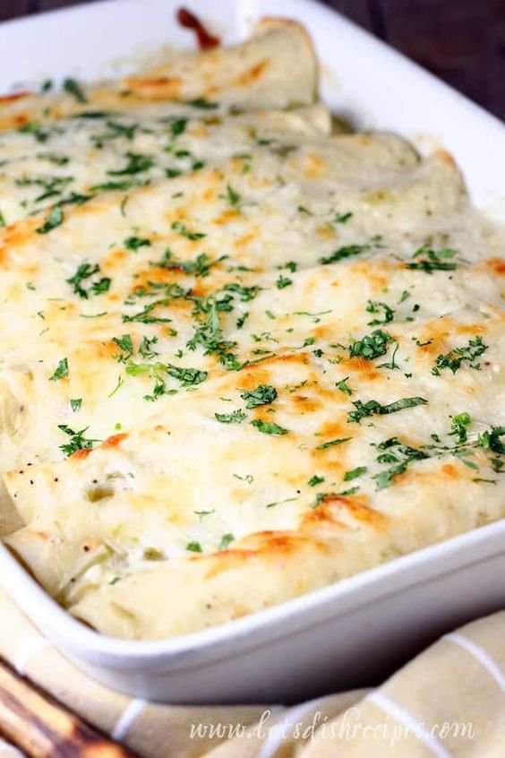 White Chicken Enchiladas with Green Chile Sour Cream Sauce