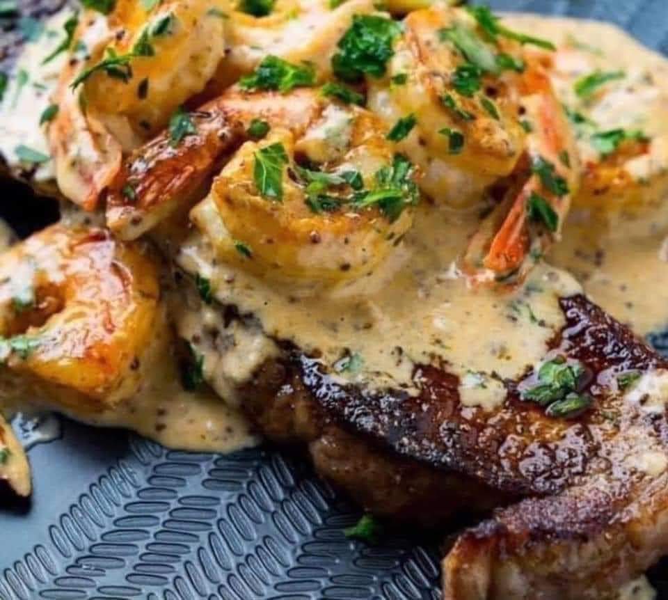 Steak and shrimp with a Creamy Cajun Sauce